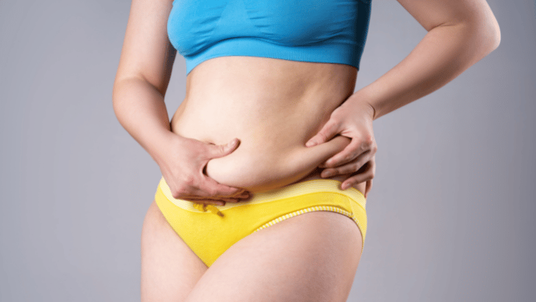 how to get rid of stomach overhang with tummy tuck